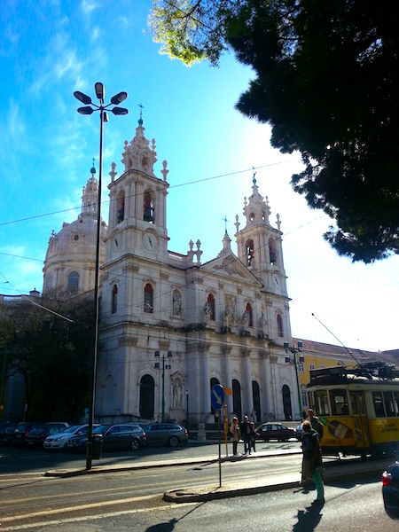Façade of the Basilica da Estrela in western Lisbon with tram #28 at bottom right. 